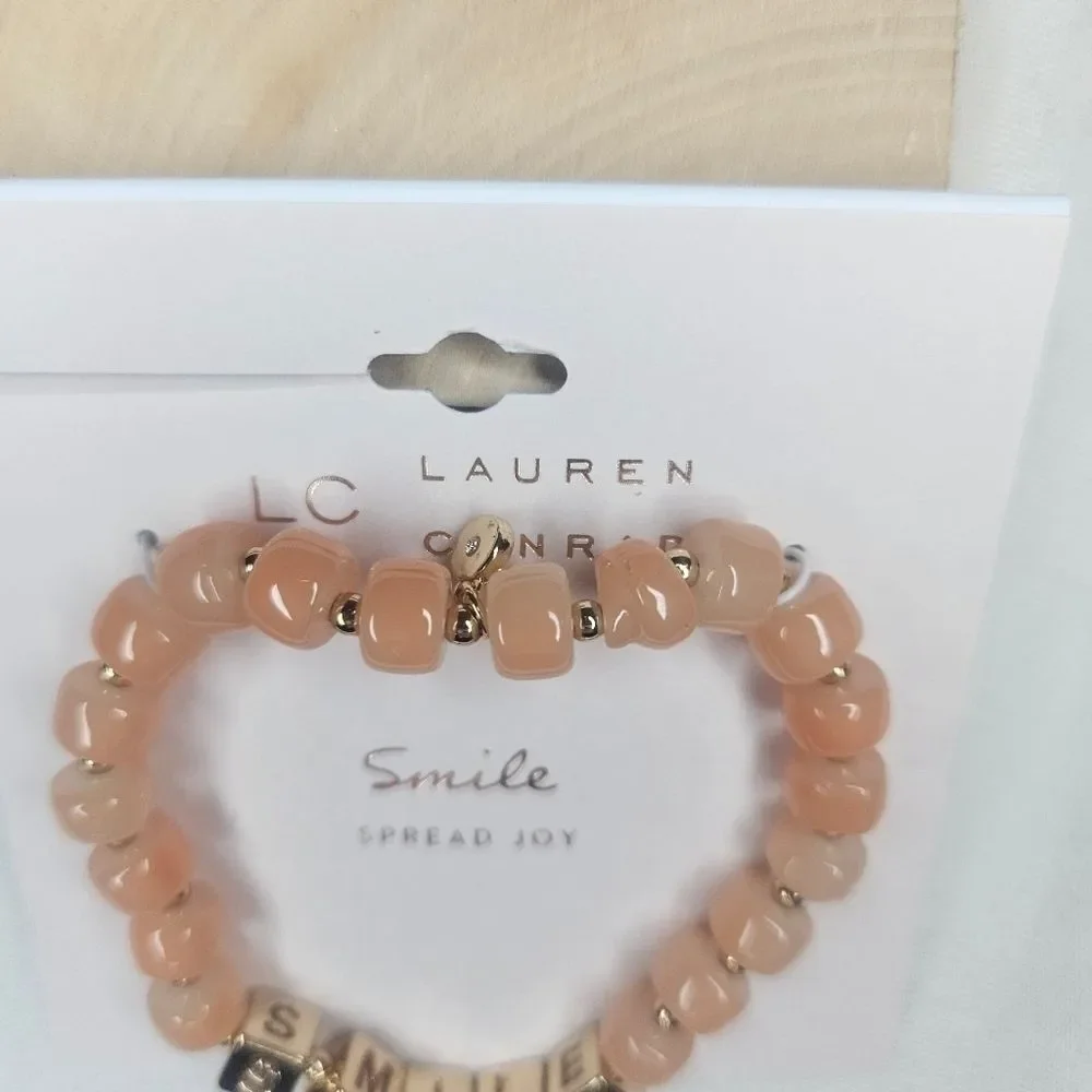 Lauren Conrad Gold Tone Metal And Peach Glass Bead Stretch Smile Bracelet